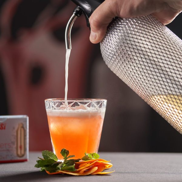Cóctel de mandarina, menta, Bonanto y soda de especias